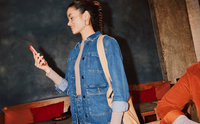 Person holding a mobile phone